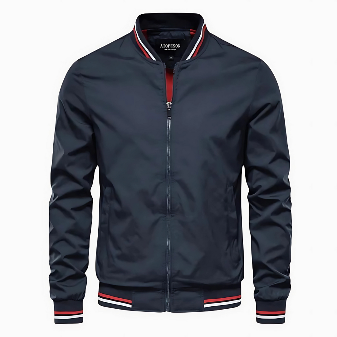 Dunkelblaue Herren-Bomberjacke mit Reißverschluss, gestreiften Bündchen und Kragen. Modische Freizeitjacke, ideal für Herbst und Frühling.
