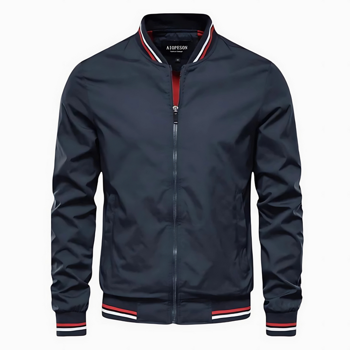 Dunkelblaue Herren-Bomberjacke mit Reißverschluss, gestreiften Bündchen und Kragen. Modische Freizeitjacke, ideal für Herbst und Frühling.