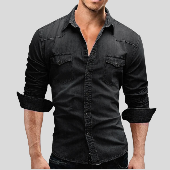 Schwarzes Herren-Jeanshemd, langärmlig, geknöpft, mit Brusttaschen, lässiger Stil, ideal für Freizeitmode und trendige Outfits.