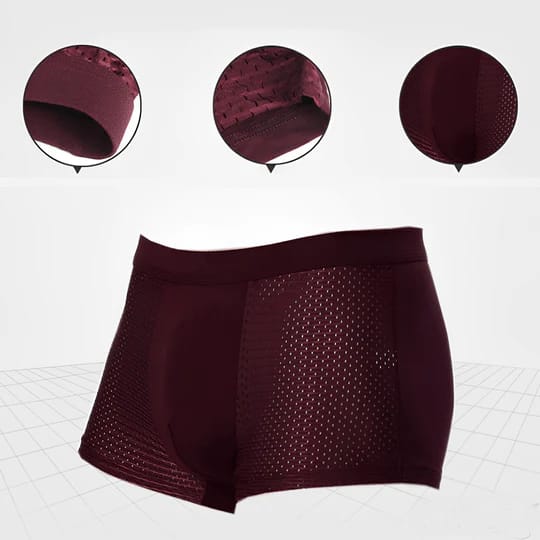 Dunkelrote Herren-Boxershorts mit atmungsaktivem Mesh-Design, elastischem Bund und nahtloser Verarbeitung. Ideal für Komfort und Stil.