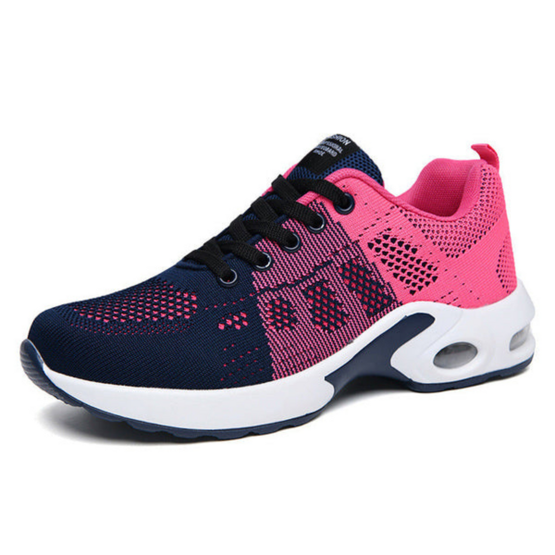Damen-Laufschuh in Blau und Pink mit atmungsaktivem Mesh-Obermaterial, weißer Sohle und schwarzer Schnürung. Ideal für Sport und Freizeit.