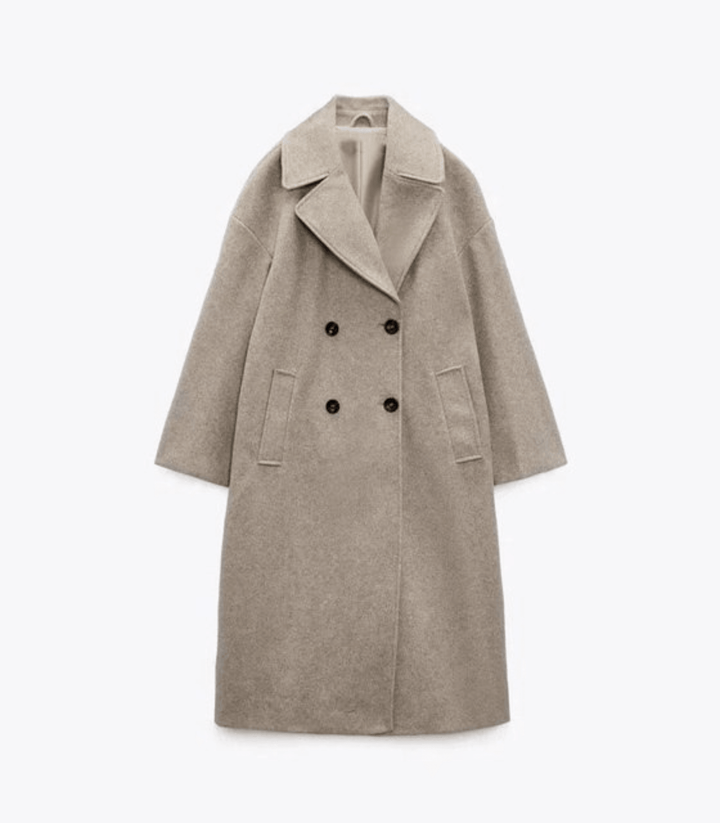 Damen Wollmantel beige, doppelreihig, mit breitem Revers und Taschen. Eleganter Wintermantel, zeitloses Design, hochwertige Mode.