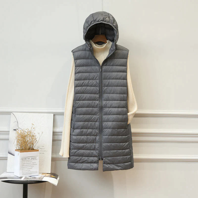 Lange Steppweste für Damen - Elegante Übergangsjacke mit Kapuze