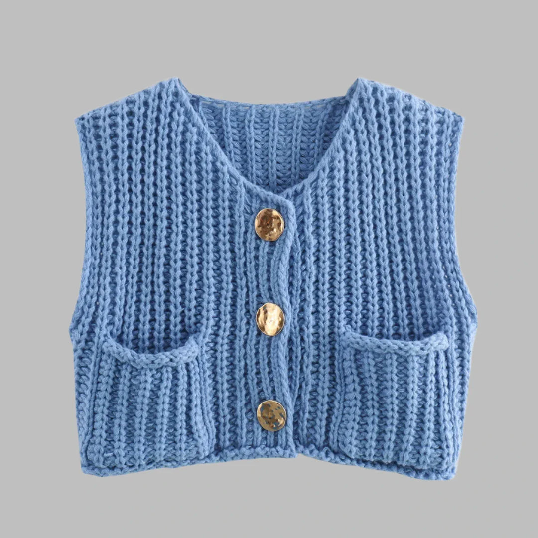 Blaue gestrickte Weste mit goldenen Knöpfen und zwei Taschen, modisches Damenoberteil, handgefertigtes Strickdesign, stilvolle Bekleidung.