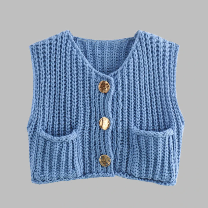 Blaue gestrickte Weste mit goldenen Knöpfen und zwei Taschen, modisches Damenoberteil, handgefertigtes Strickdesign, stilvolle Bekleidung.