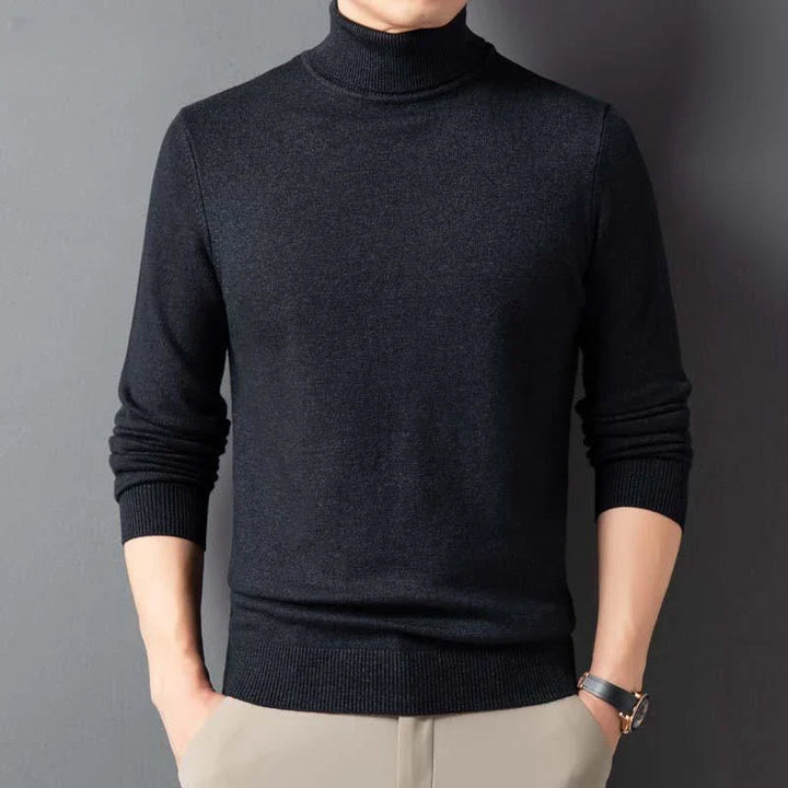 Schwarzer Rollkragenpullover für Herren, elegant und modern, aus weichem Material. Perfekt für Herbstmode und stilvolle Outfits.