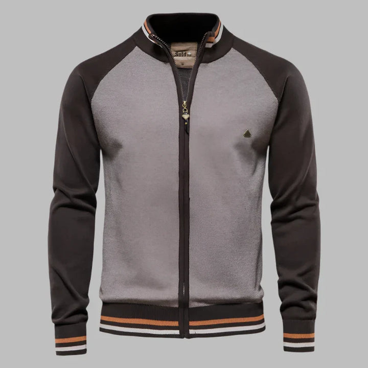 Graue und schwarze Herren-Bomberjacke mit Reißverschluss, gestreiftem Kragen und Bündchen. Modische Freizeitjacke für Herren.