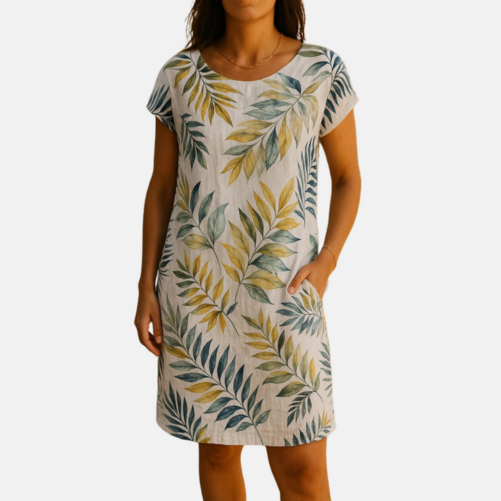Damen Sommerkleid mit Blattmuster, kurzärmelig, knielang, aus leichtem Stoff. Perfekt für Freizeit und Strand. Modetrend 2023.