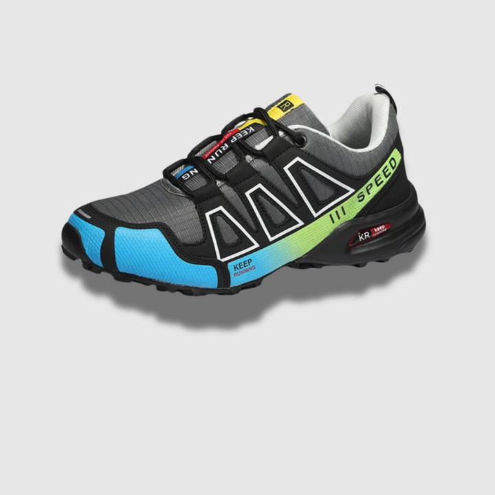 Grauer und blauer Sportschuh mit gelben und roten Akzenten, robustem Profil und Schnürsystem. Ideal für Outdoor-Aktivitäten und Trailrunning.