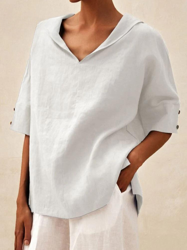 Damen Leinenbluse in Weiß, lässiger Schnitt, V-Ausschnitt, halblange Ärmel, ideal für Sommermode und Freizeitkleidung.