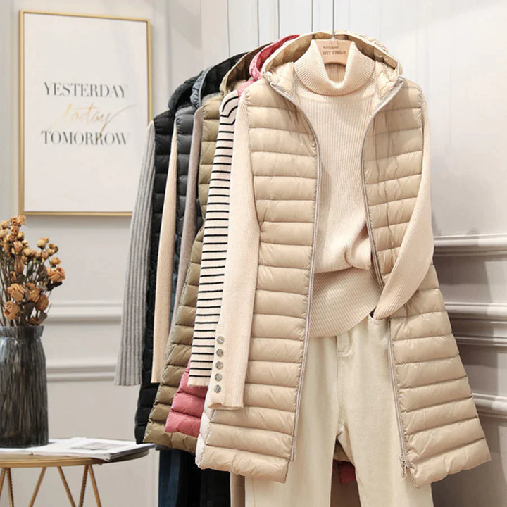 Lange Steppweste für Damen - Elegante Übergangsjacke mit Kapuze