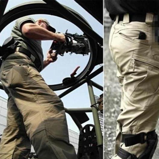 Taktische Cargohose in Beige, robustes Design, ideal für Outdoor-Aktivitäten und Arbeit, mit mehreren Taschen und verstärkten Nähten.