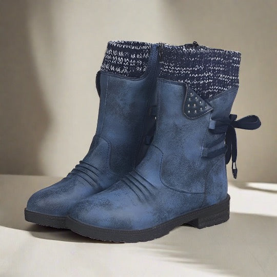 Blaue Damenstiefel mit Strickbündchen und Schleifendetail, rutschfeste Sohle, modisch und bequem, ideal für Herbst und Winter.