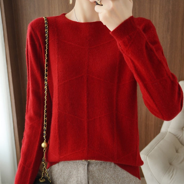 Roter Damenpullover aus Wolle, elegant und warm, mit geometrischem Muster. Perfekt für Herbstmode und stilvolle Winteroutfits.