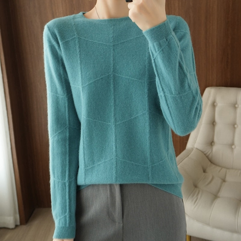 Damenpullover in Türkis, geometrisches Strickmuster, langärmelig, weiches Material, modisch, ideal für Herbst und Winter, eleganter Look.