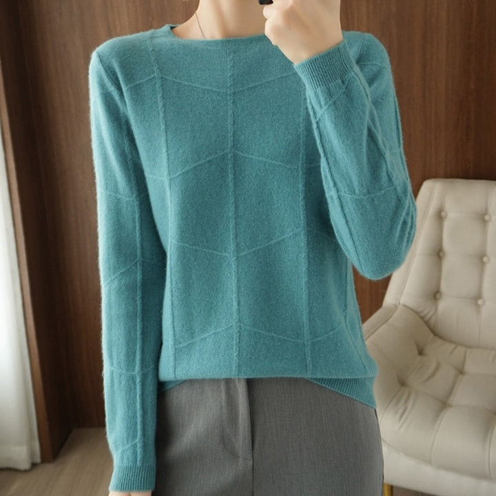 Damenpullover in Türkis, geometrisches Strickmuster, langärmelig, weiches Material, modisch, ideal für Herbst und Winter, eleganter Look.