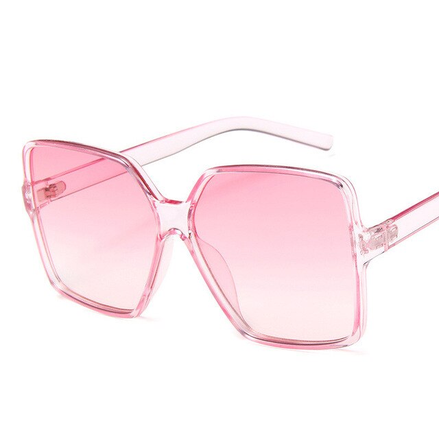 Rosa übergroße Sonnenbrille mit quadratischen Gläsern und transparentem Rahmen, modisches Accessoire, idealer UV-Schutz für Damen.