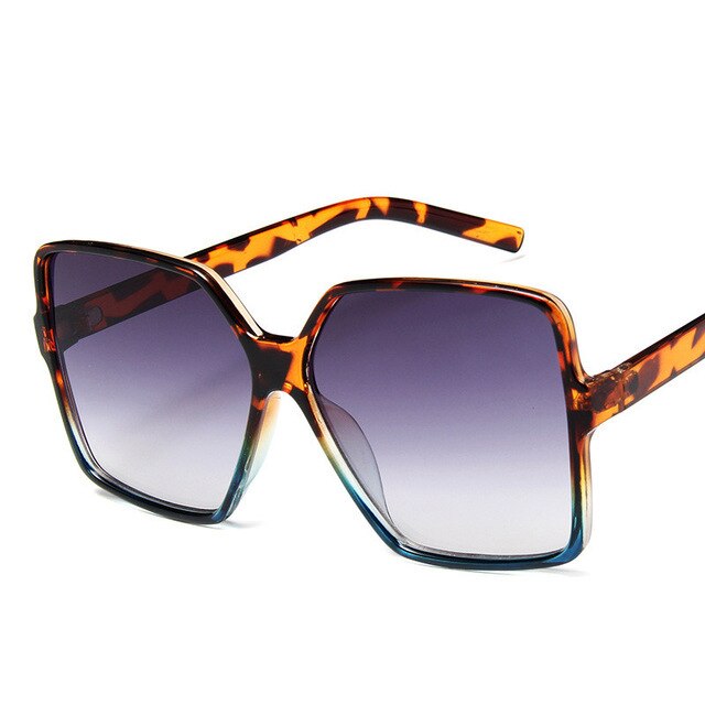 Tortoise-Sonnenbrille mit großen quadratischen Gläsern, UV-Schutz, modisches Accessoire, Damenmode, trendige Brille, Sommerstil.
